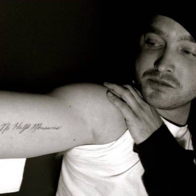 What is the meaning of Aaron Paul’s tattoos?